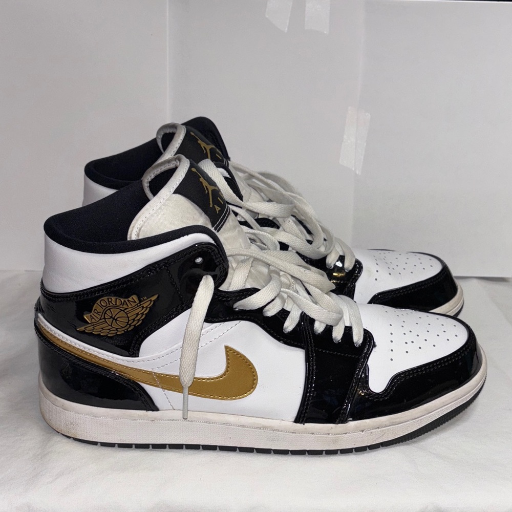 Jordan Black and Gold Sneakers